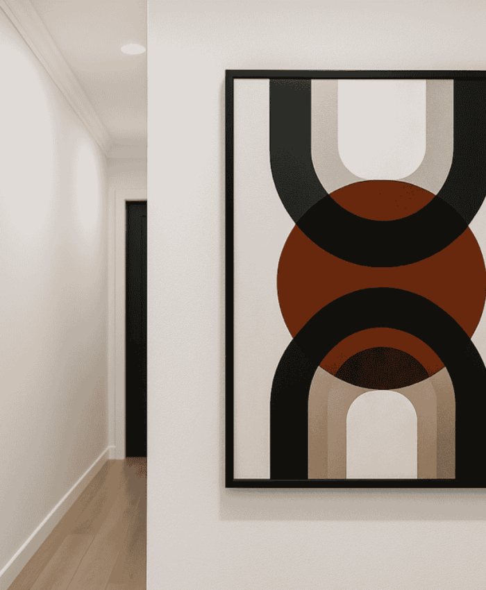 Un couloir blanc transformé avec harmonie grâce à la couleur et un jeu de cadres – Réalisation à Marcheprime.